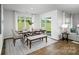 Dining area with table, bench, and access to backyard at 4614 Harris Elliot Rd, Lincolnton, NC 28092
