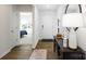 Bright entryway with hardwood floors, console table, and views into adjacent rooms at 4614 Harris Elliot Rd, Lincolnton, NC 28092