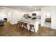 Kitchen with granite countertops, white cabinets, and an island with seating at 4614 Harris Elliot Rd, Lincolnton, NC 28092