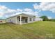 Home's spacious backyard and covered patio is perfect for entertaining and relaxation at 4614 Harris Elliot Rd, Lincolnton, NC 28092