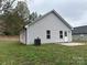 Gray house side with a small patio at 53 Soloman St, Wadesboro, NC 28170