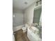 Bathroom with granite countertop and shower/tub at 622 N Walnut St, Kannapolis, NC 28081