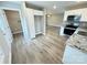 Modern kitchen with white cabinets and granite countertops at 622 N Walnut St, Kannapolis, NC 28081