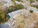 Aerial view of community building close to the street with adjacent parking at 7000 Quail Hill Rd, Charlotte, NC 28210