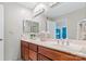 Bright bathroom with a double sink vanity, neutral walls, and modern fixtures at 7000 Quail Hill Rd, Charlotte, NC 28210