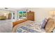 Bedroom featuring sliding closet doors and a view of the outdoor patio area from the bed at 7000 Quail Hill Rd, Charlotte, NC 28210
