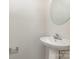 Cozy powder room with pedestal sink and simple modern fixtures at 828 Renee Ave, Fort Mill, SC 29715