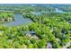 Aerial view of house near lake, highlighting waterfront location at 908 Thorn Ridge Ln, Lake Wylie, SC 29710