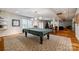 Finished basement with a pool table and access to other entertainment areas at 908 Thorn Ridge Ln, Lake Wylie, SC 29710