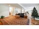 Finished basement recreation room with pool table, seating area, and hardwood floors at 908 Thorn Ridge Ln, Lake Wylie, SC 29710