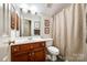 Clean bathroom with single vanity, toilet, and shower/tub combo at 908 Thorn Ridge Ln, Lake Wylie, SC 29710