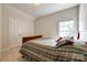 Simple bedroom with double bed and plenty of closet space at 908 Thorn Ridge Ln, Lake Wylie, SC 29710