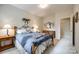 Charming bedroom with ornate bed frame and private closet at 908 Thorn Ridge Ln, Lake Wylie, SC 29710