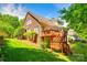 Two-story wooden deck and stairs leading to backyard at 908 Thorn Ridge Ln, Lake Wylie, SC 29710