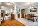 Elegant dining room with hardwood floors and large windows at 908 Thorn Ridge Ln, Lake Wylie, SC 29710