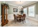 Formal dining room featuring a wooden table and chandelier at 908 Thorn Ridge Ln, Lake Wylie, SC 29710