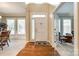 Bright entryway with hardwood floors, leading to dining and living areas at 908 Thorn Ridge Ln, Lake Wylie, SC 29710