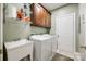 Convenient laundry room with washer, dryer, and extra storage at 908 Thorn Ridge Ln, Lake Wylie, SC 29710