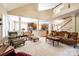 Spacious living room with hardwood floors, high ceilings, and ample natural light at 908 Thorn Ridge Ln, Lake Wylie, SC 29710