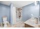 Updated bathroom with tub shower combo and granite vanity at 1047 College Ave, Shelby, NC 28152