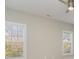 Bright bedroom with two big windows with natural light at 1103 N Sharon Amity Rd, Charlotte, NC 28211