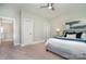 Bedroom featuring carpet flooring and access to additional rooms at 1103 N Sharon Amity Rd, Charlotte, NC 28211