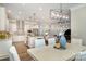 Open-concept living space showing the kitchen and dining area at 1103 N Sharon Amity Rd, Charlotte, NC 28211