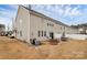 Townhouse exterior with patio and landscaping at 11121 Sandstone Rd, Charlotte, NC 28277