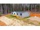 New manufactured home with deck and wooded setting at 118 River Ridge Ln, Hickory, NC 28601