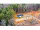 Aerial view of new manufactured home on wooded lot at 118 River Ridge Ln, Hickory, NC 28601