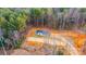 Aerial view of a gray manufactured home in woods at 118 River Ridge Ln, Hickory, NC 28601