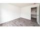 Simple bedroom with gray flooring and access to a small workspace at 118 River Ridge Ln, Hickory, NC 28601