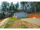Side view of gray manufactured home with deck at 118 River Ridge Ln, Hickory, NC 28601