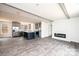 Open concept kitchen with island, stainless steel appliances, and gray cabinets at 118 River Ridge Ln, Hickory, NC 28601