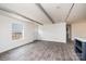 Open concept living area with gray flooring and a view into the kitchen at 118 River Ridge Ln, Hickory, NC 28601