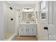 Modern bathroom with white subway tiles, a vanity, and a walk-in shower at 126 Terrace Dr, Bessemer City, NC 28016