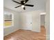 Bedroom featuring hardwood floors, a window with natural light, and a ceiling fan at 126 Terrace Dr, Bessemer City, NC 28016