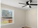 Bedroom with large window, hardwood floors and a ceiling fan at 126 Terrace Dr, Bessemer City, NC 28016