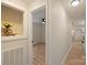 Bright hallway with hardwood floors and access to other rooms at 126 Terrace Dr, Bessemer City, NC 28016