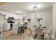 Modern kitchen with island, stainless steel appliances, and white cabinets at 126 Terrace Dr, Bessemer City, NC 28016