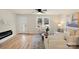 Bright living room with hardwood floors, fireplace, and comfy seating at 126 Terrace Dr, Bessemer City, NC 28016