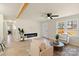 Bright living room with hardwood floors, exposed beam, and fireplace at 126 Terrace Dr, Bessemer City, NC 28016