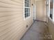 Small screened porch with light beige siding at 14602 Lions Paw St, Charlotte, NC 28273