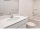 Well-lit bathroom featuring modern fixtures, a large sink, and a shower-tub combination at 1766 Falls Cove Rd, Newton, NC 28658