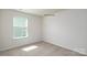 Bright bedroom with a large window offering ample natural light at 1766 Falls Cove Rd, Newton, NC 28658