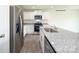 Kitchen with stainless steel appliances and granite countertops at 1766 Falls Cove Rd, Newton, NC 28658