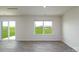 Spacious living room with natural light and a sliding glass door at 1766 Falls Cove Rd, Newton, NC 28658
