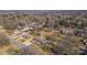 Wide aerial view showing the house, neighborhood, and surrounding landscape features at 200 11Th St, Spencer, NC 28159