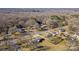 Aerial view showcasing the house's neighborhood, its proximity to amenities, and surrounding landscape at 200 11Th St, Spencer, NC 28159