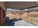Covered back porch overlooking yard at 200 11Th St, Spencer, NC 28159